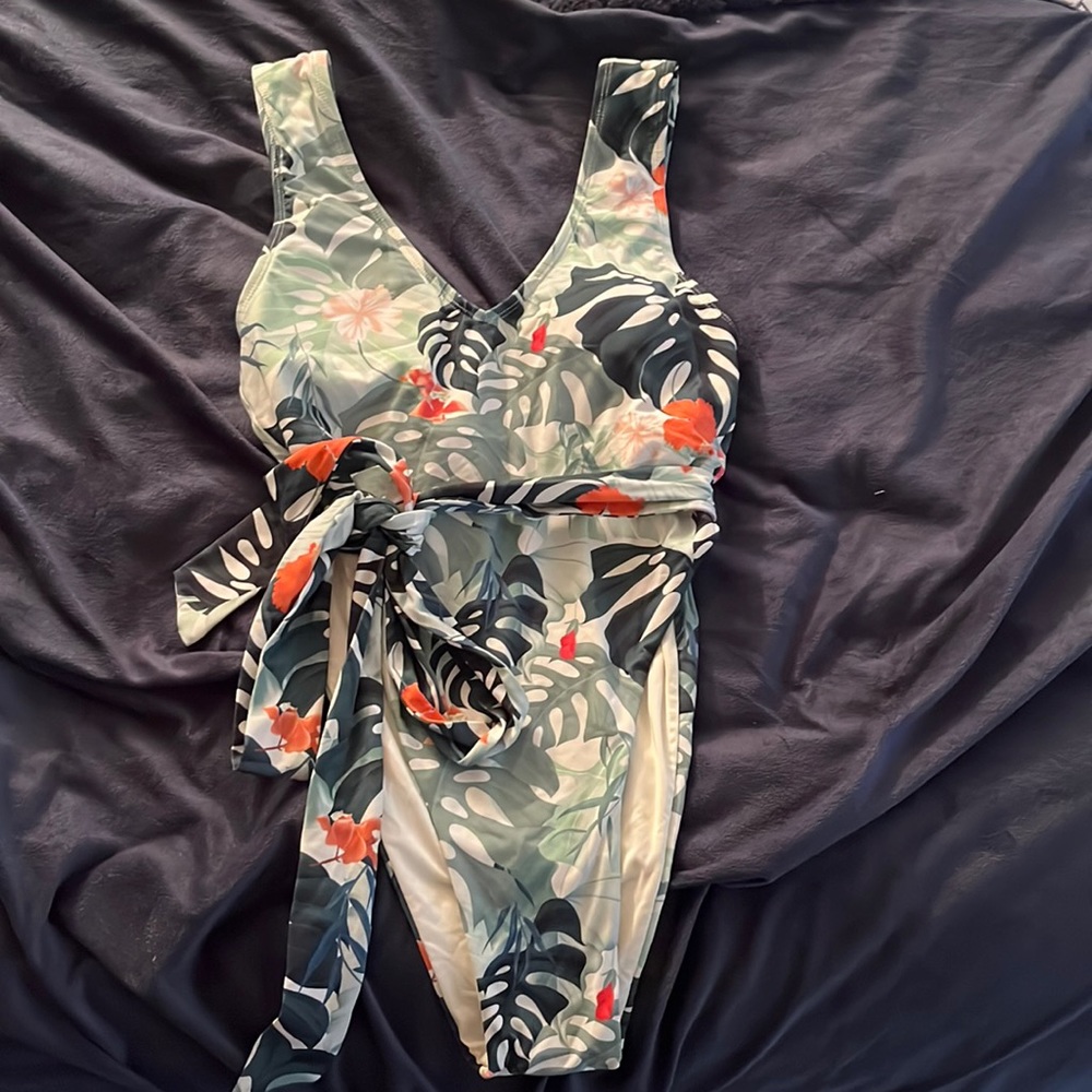 One piece high rise tropical swim suit with removable belt!